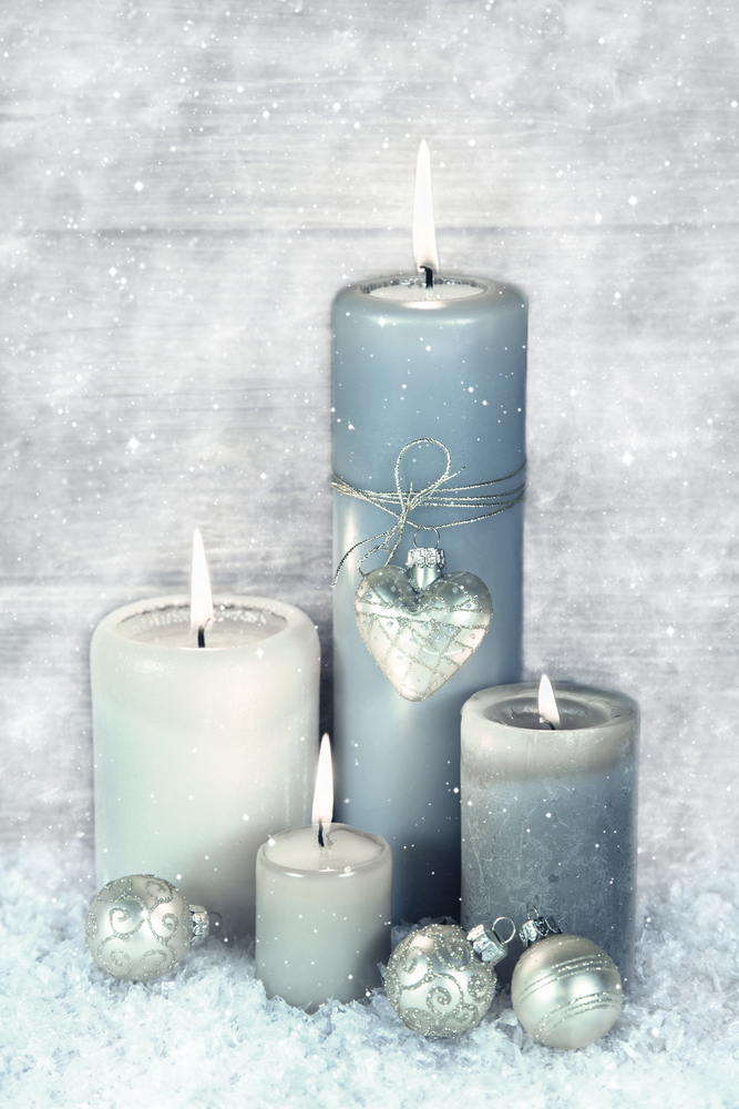 Candele con fiocchi di neve